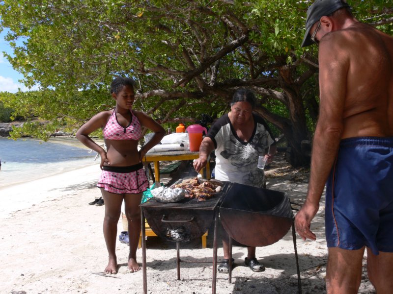 lesciabernadetteturningthechickenonthebbq.jpg